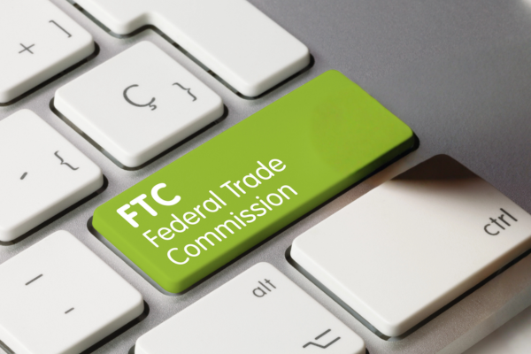 Keyboard with a green key that reads FTC Federal Trade Commission